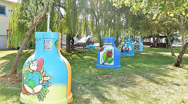 A glass bottle is running the computer